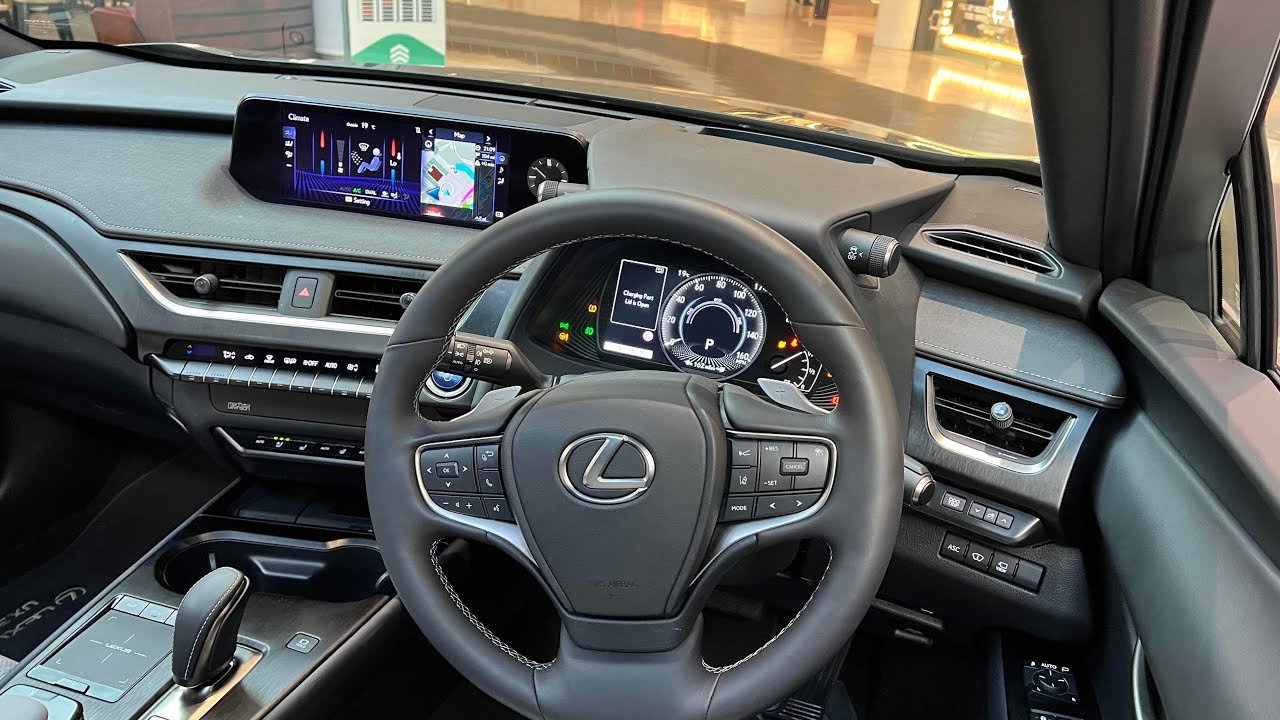 Lexus EV model UX300e compared to Tesla model 3