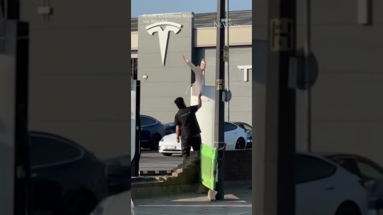 Musk salute cutouts placed on Tesla chargers in London